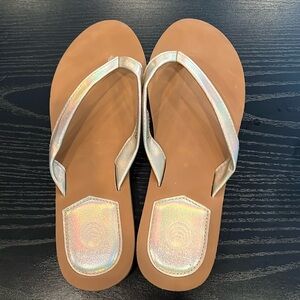 High Tide flip flops gold/rose gold. Cozumel style new without tags size 10.